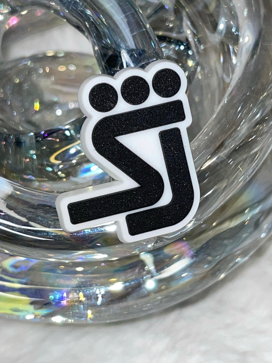S.J